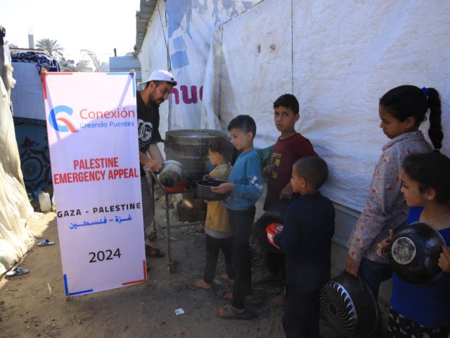 DISTRIBUTING HUMANITARIAN AID IN GAZA